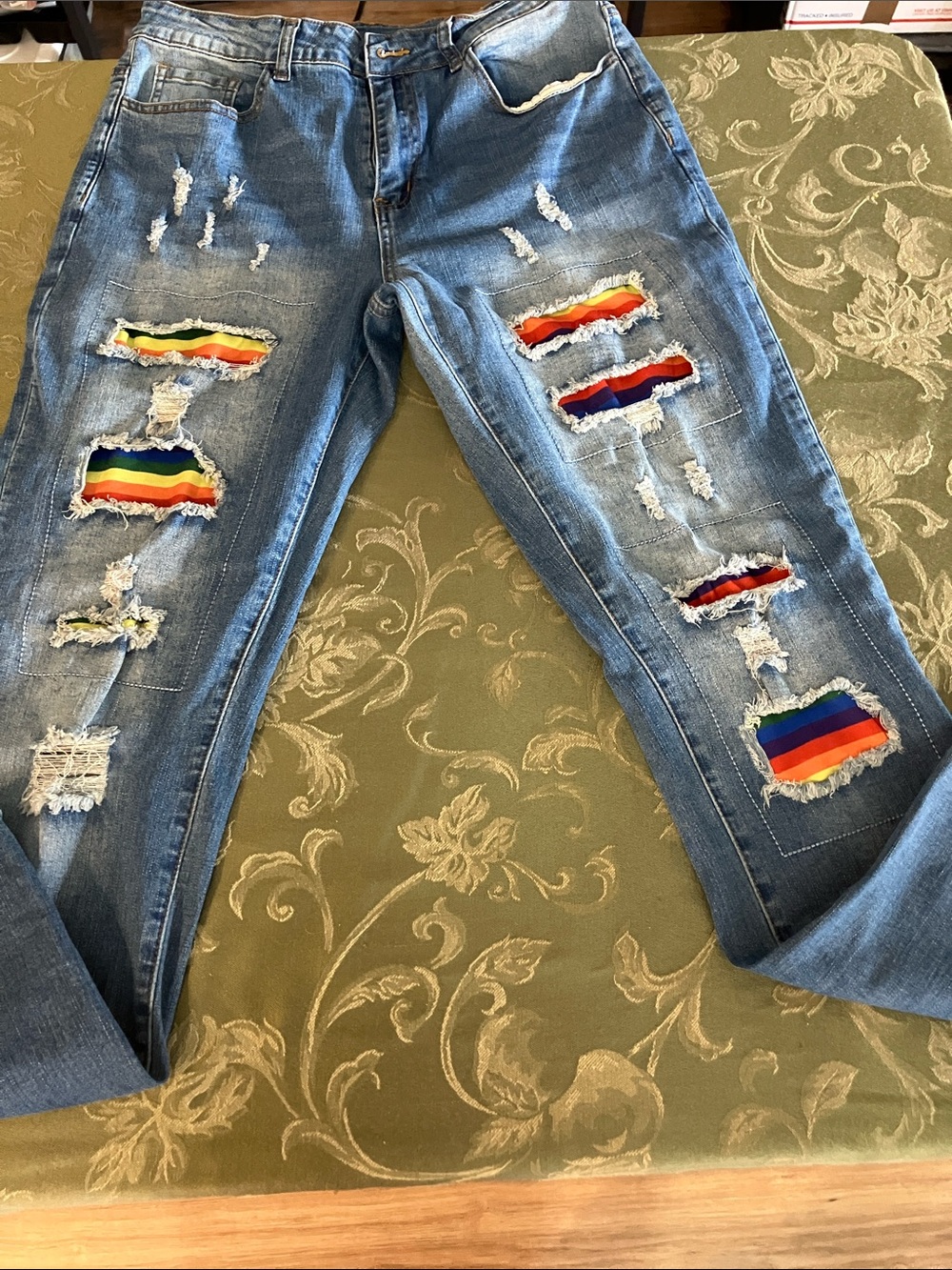 Distressed Blue Women's Jeans with Rainbow Patch Details